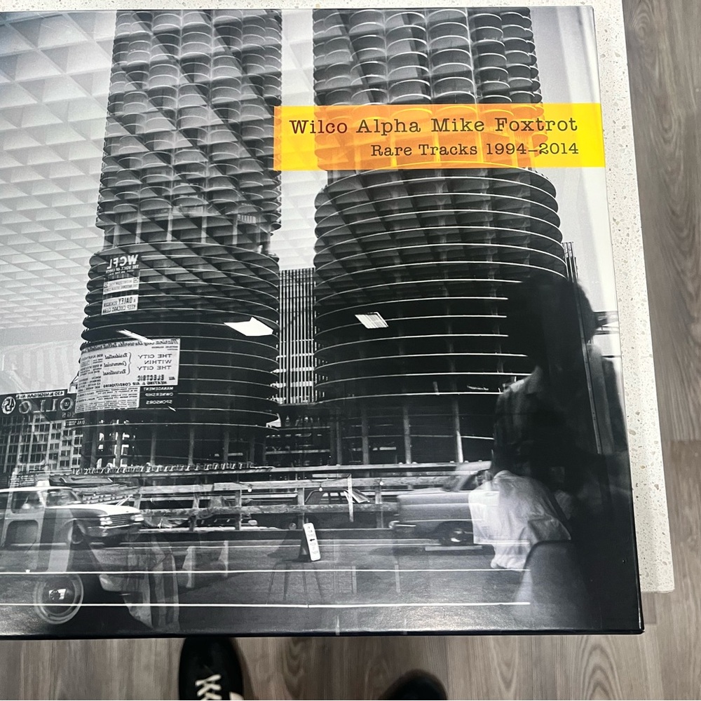 Alpha Mike Foxtrot Vinyl Record - Black and Orange